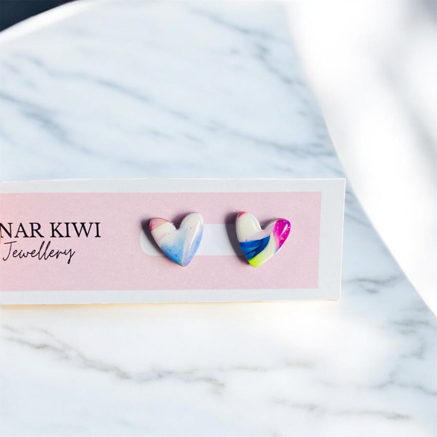 Love whispers heart stud earrings