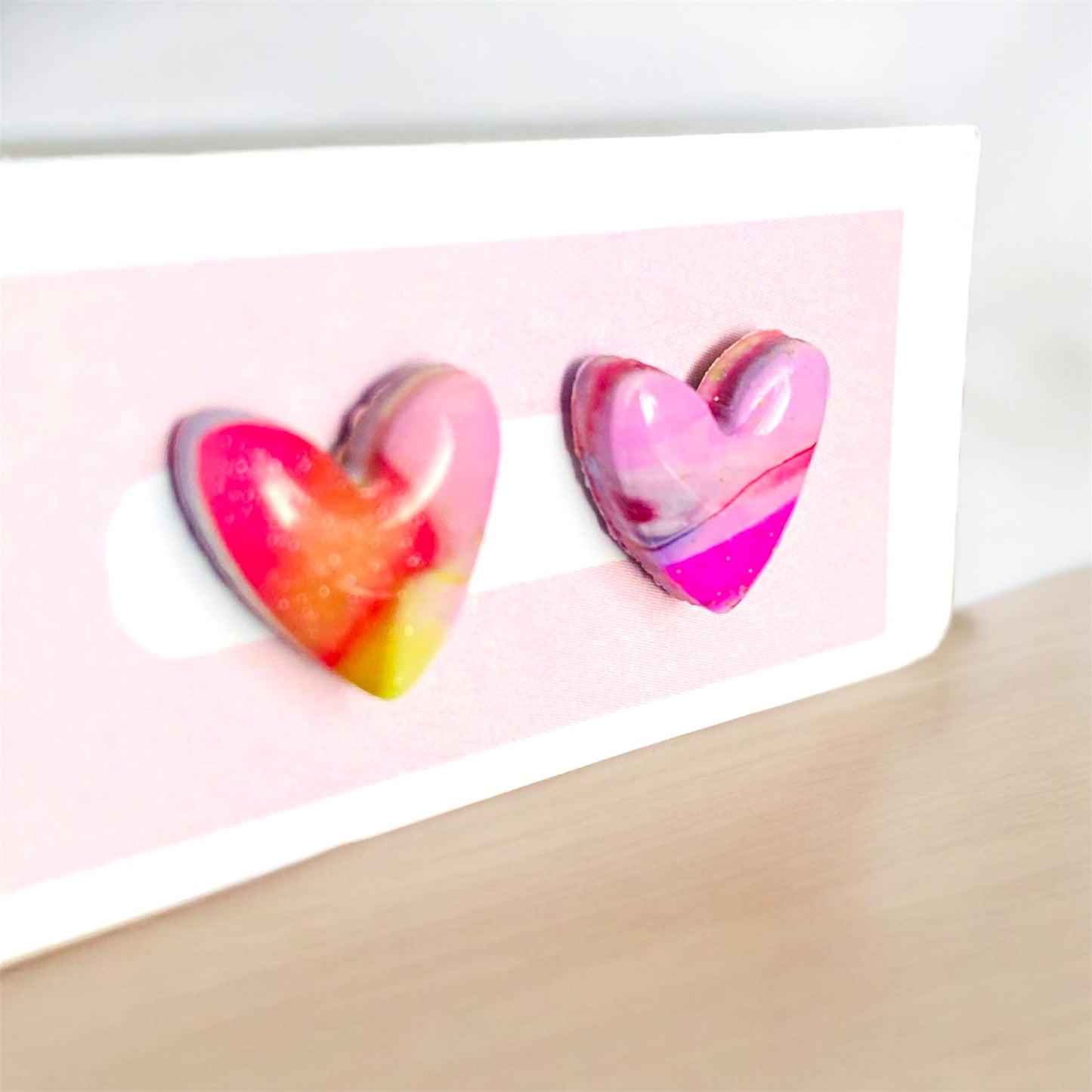 Love whispers heart stud earrings