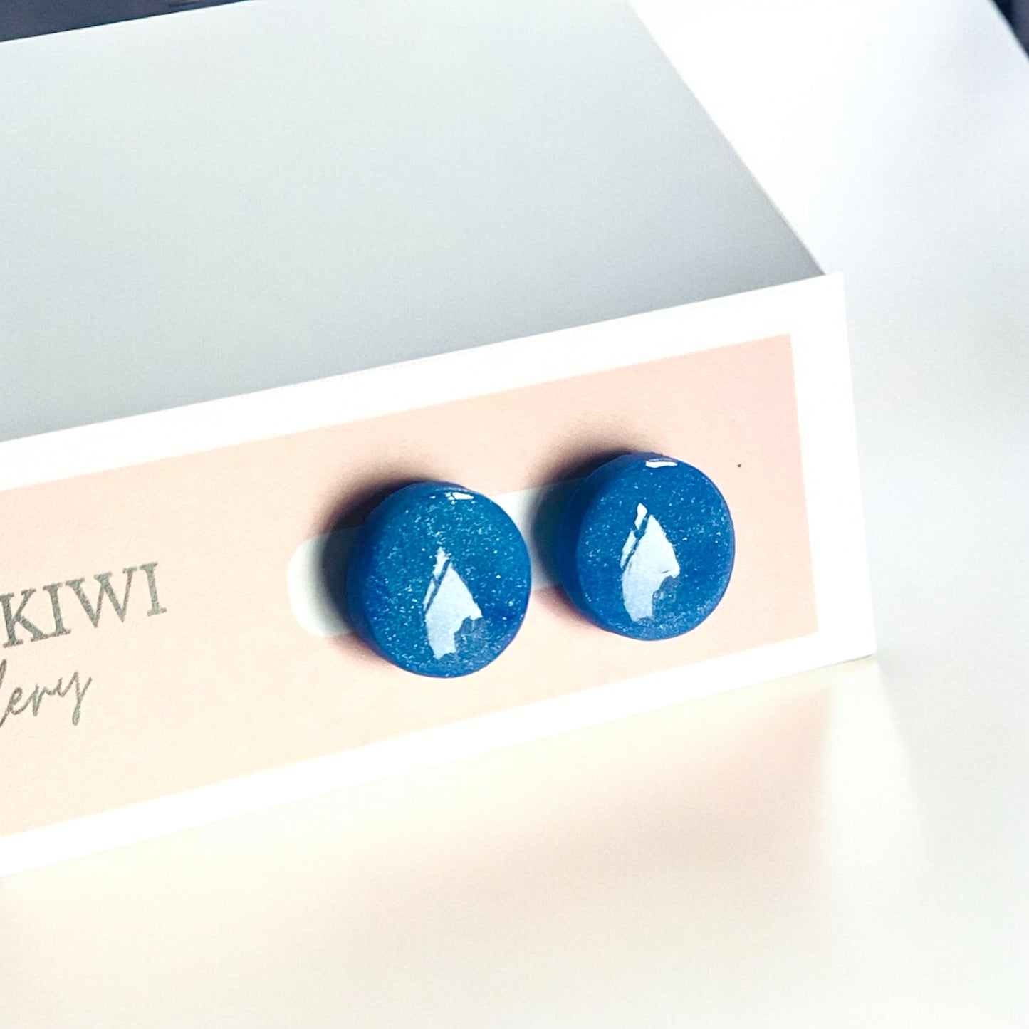 Be Resilient - Blue circle studs