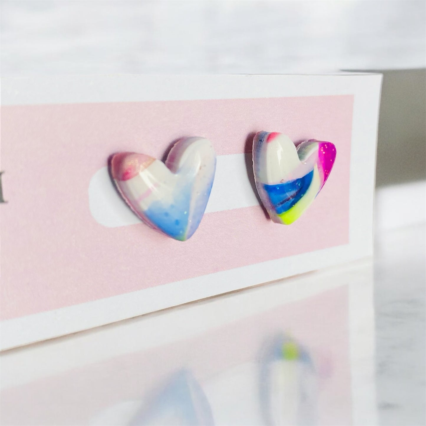 Love whispers heart stud earrings