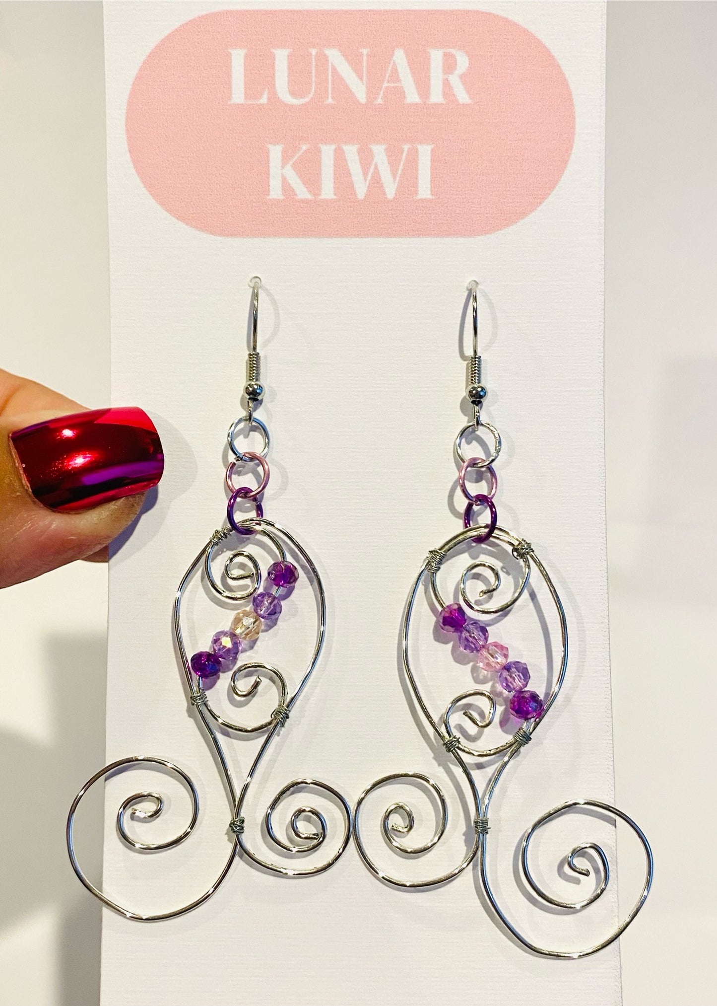 Long purple spiral earrings