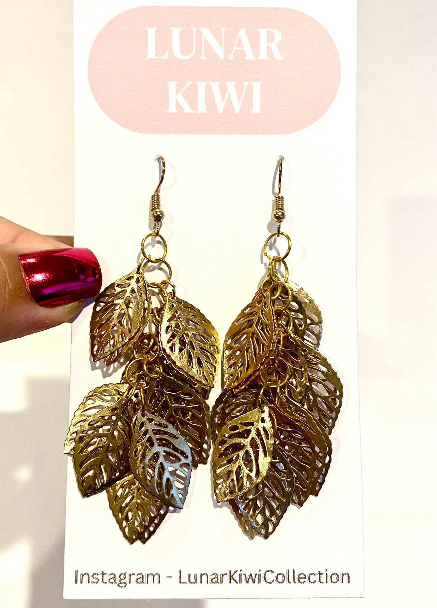 Long gold leaf earrings