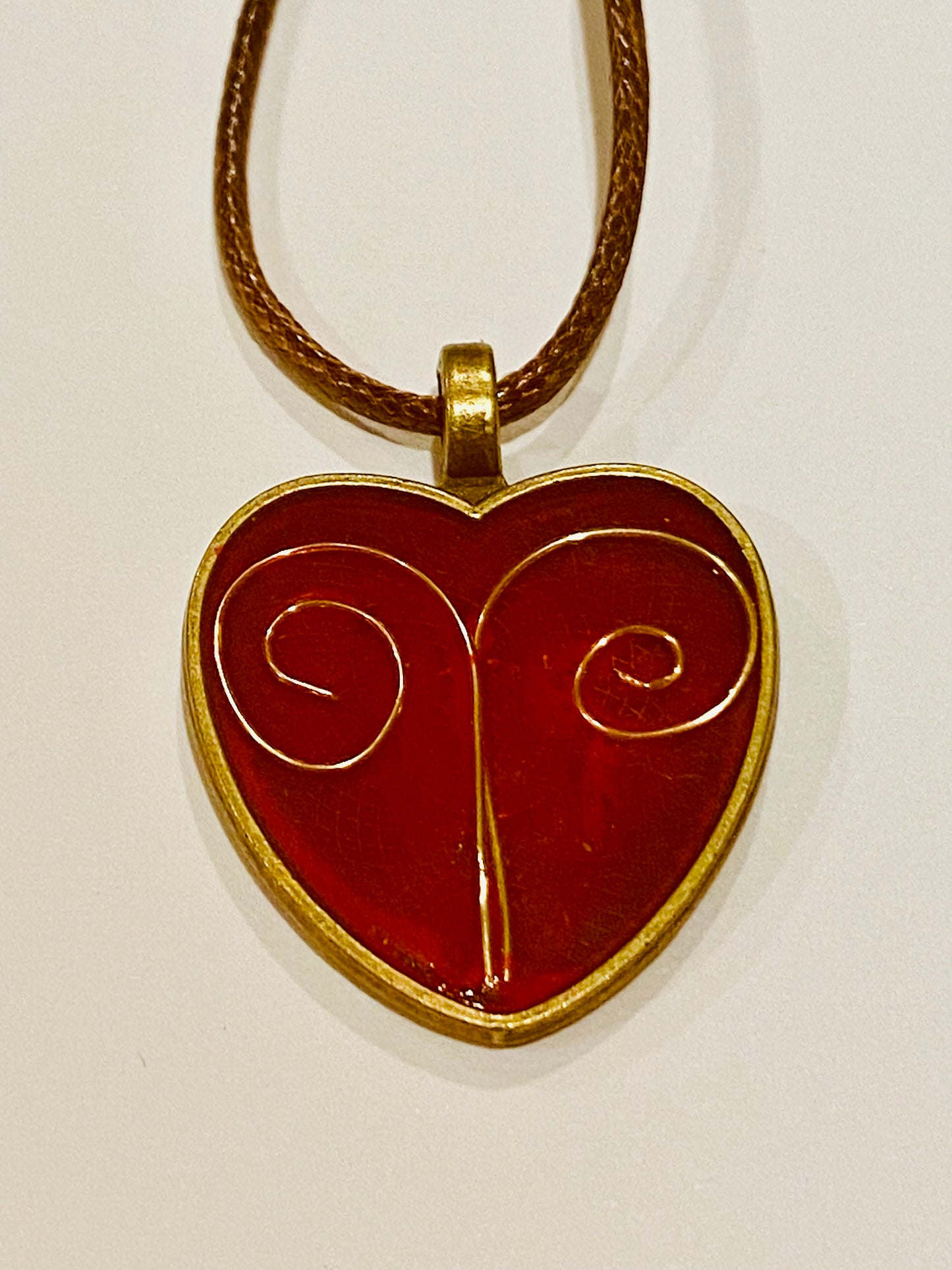 Red wire heart resin pendant