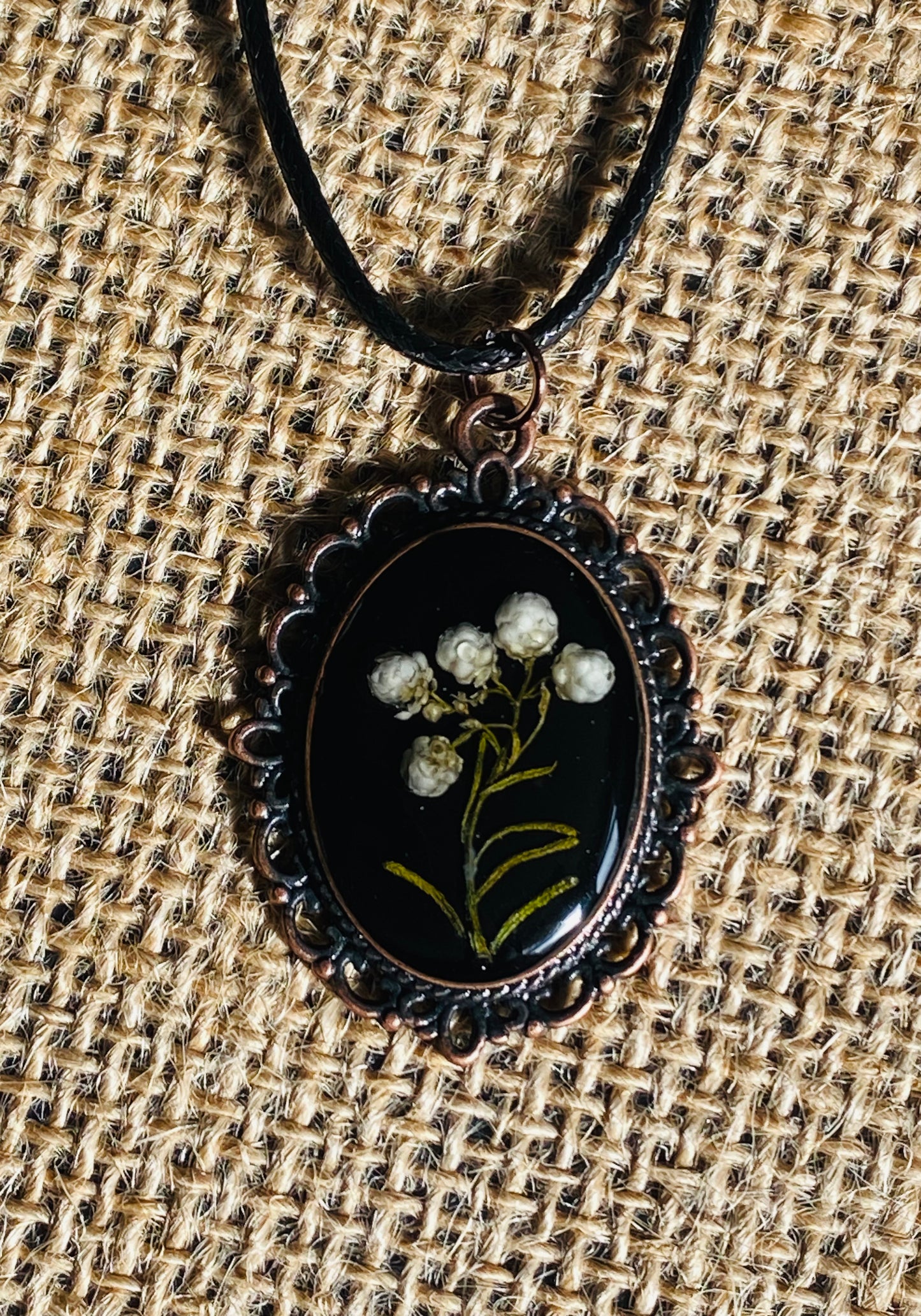 Botanical white flowers in resin pendant