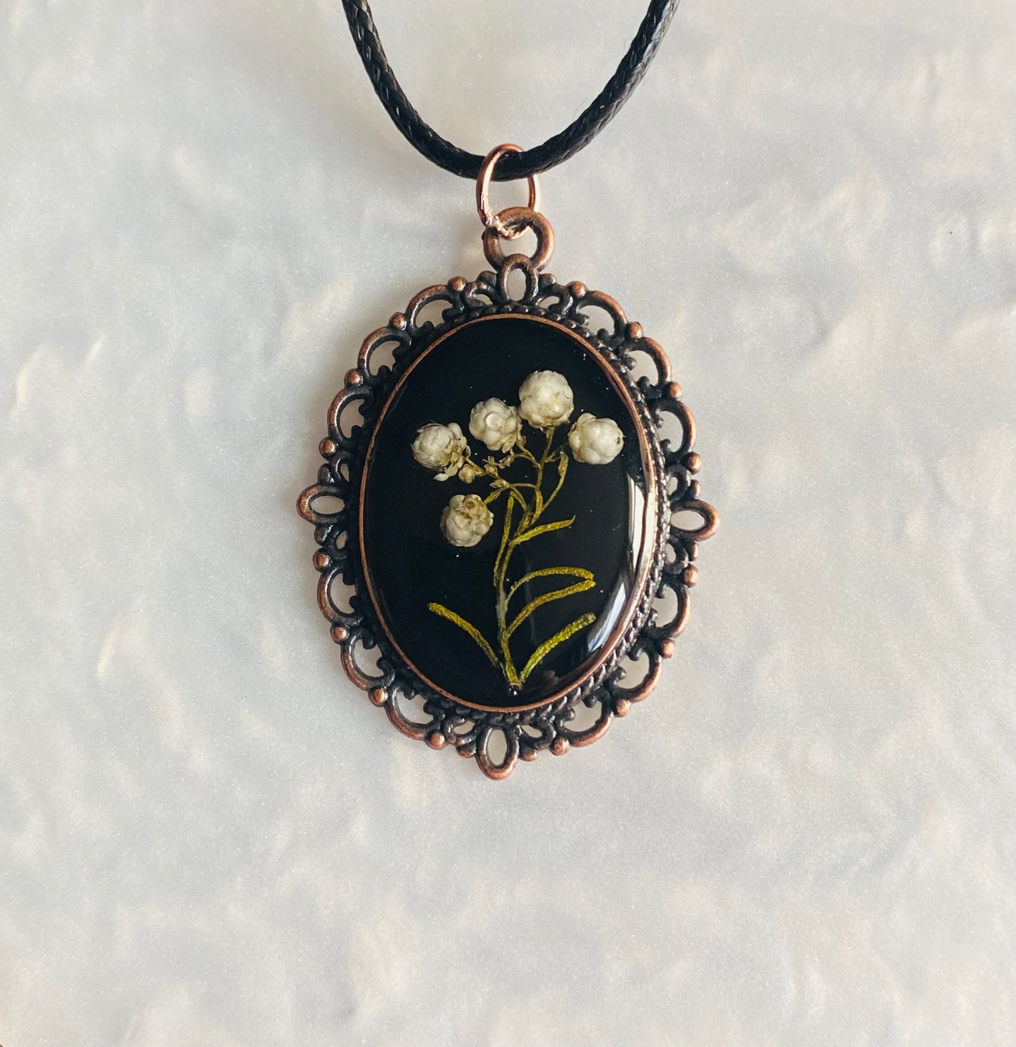 Botanical white flowers in resin pendant