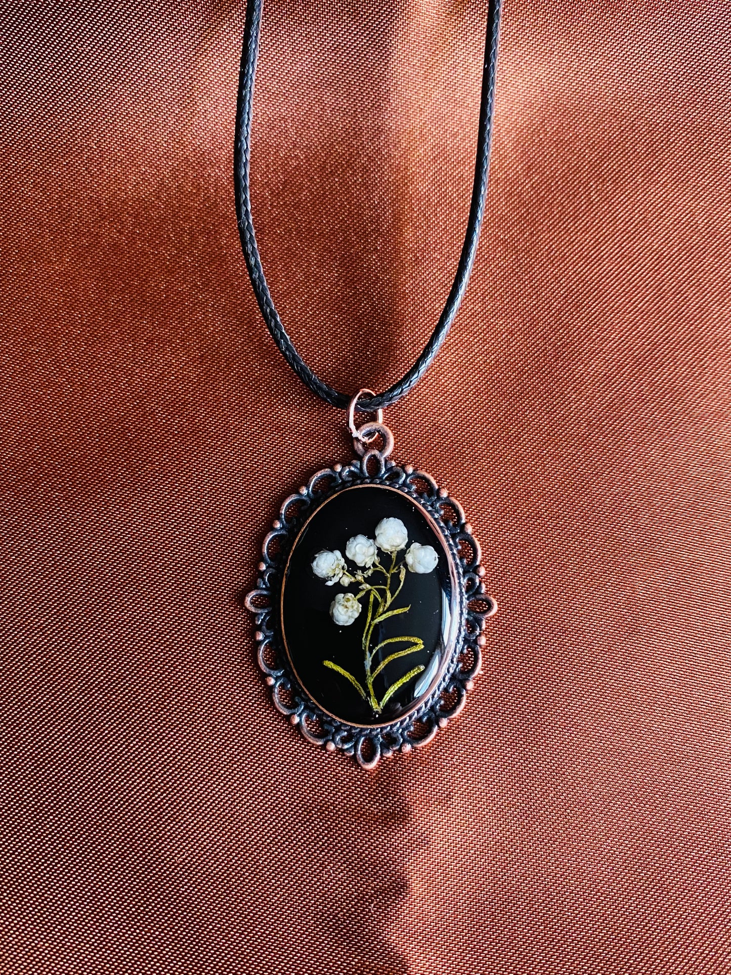 Botanical white flowers in resin pendant